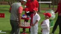 A brave boy hits a hole-in-one in front of Tiger Woods