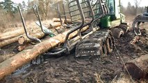 John Deere 810D stuck in deep mud, cardan joint broke, extreme mud conditions