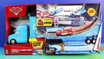 Disney Pixar Cars Drop & Jump Playset Dinoco Hauler With Lightning McQueen & Chick Hicks
