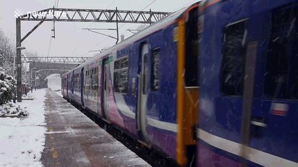 Snow blankets UK station