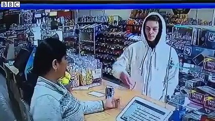 Cashier wrestles with armed robber