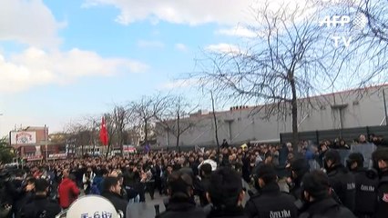 Anti-Erdogan newspaper defiant, police disperse protesters