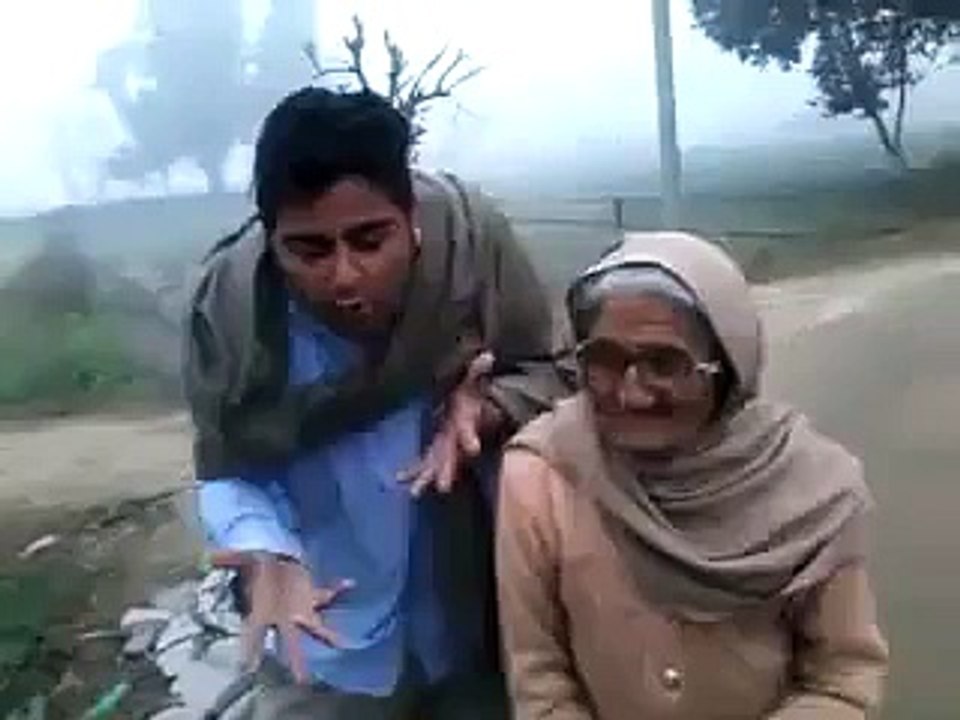 young boy joking with old women.shameful
