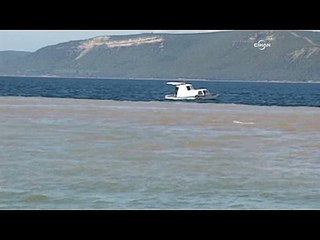 Yağmur Çanakkale Boğazı'nı iki renge dönüştürdü