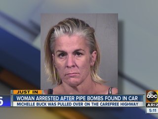 Pair arrested after pipe bombs found in car