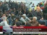 Cientos de refugiados, atrapados en frontera de Grecia con Macedonia