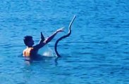 Hold My Beer As This Snake Attacks Me While I Take a Swim