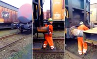 An Extremely Dangerous Way To Connect Railroad Cars