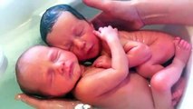 both hugging to each other - Twin Baby Bath