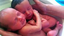 both hugging to each other - Twin Baby Bath
