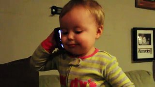 Baby Talks to Dad on Phone