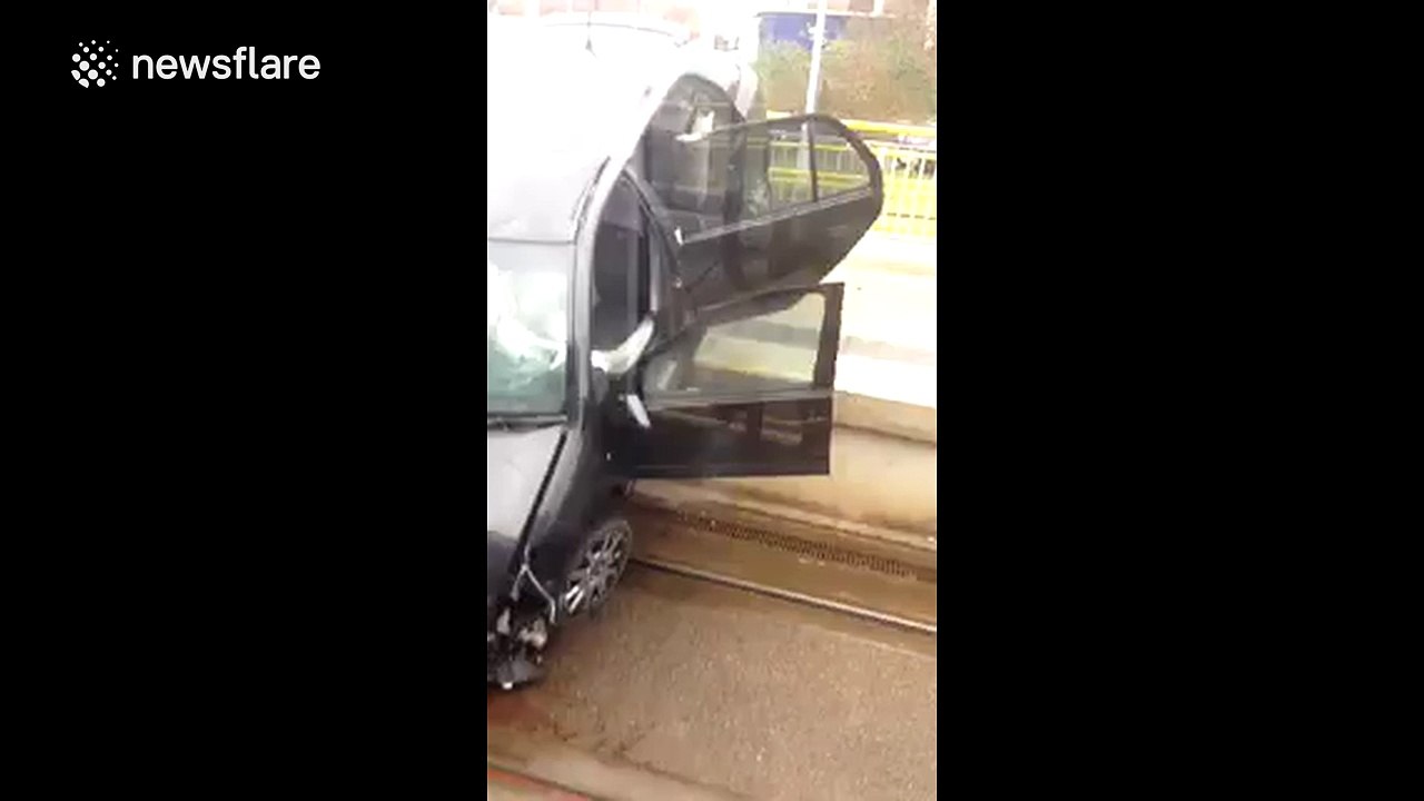 Car crashes into Manchester tram stop after police chase