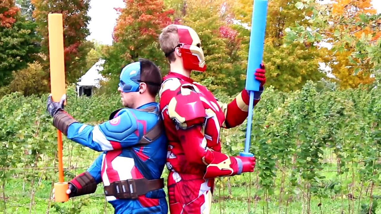 Iron Man vs Captain America in Real Life Battle! Superhero Fights - Playtime & Fun with Water Guns