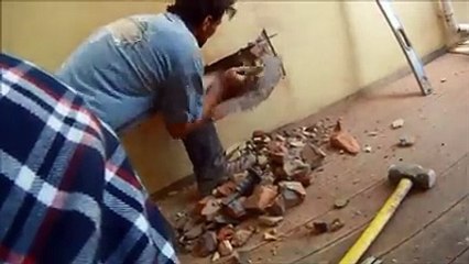 Cat is rescued by heroic builder after being stuck in a wall for three days.