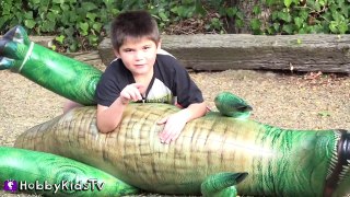 HobbyPig Battles Giant T-Rex Inflatable Dinosaur! Punching Bag Fun by HobbyKidsTV