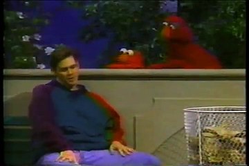 Jim Carrey on sesame street in 1993 showing us the saddest goddamn feet I've ever seen.