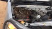 Descubren serpiente pitón en motor de su jeep