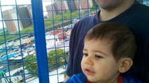 One Year Old Baby Isaac rides the Ferris Wheel at Coney Islands Luna Park in New York