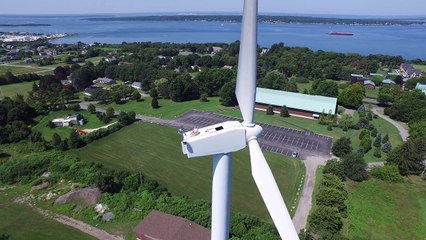 Drone Captures Man Sunbathing on Wind Turbine