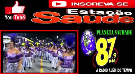 Ju Isen no momento exato em que tira a roupa em desfile da Unidos da Peruche