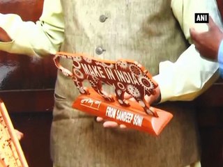 Kanpur carpenter gifts Gita carved on wood to PM Modi