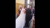 Child jumps on bride’s train just as she goes down the aisle.