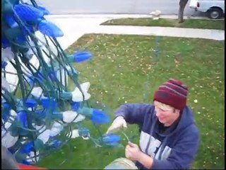 Hanging Christmas Lights Outside On Roof Landscapers