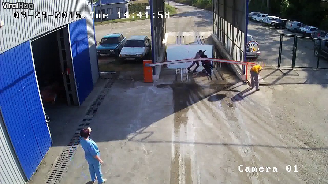 Two inebriated, Russian women crash their scooter into a road barrier