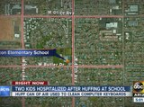 Kids hospitalized after huffing at school