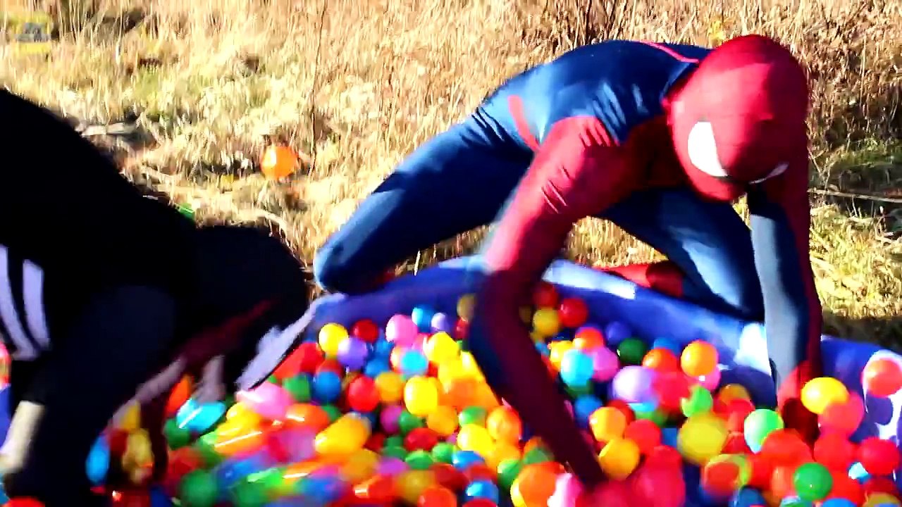 Spiderman vs Venom with Iron Man in Real Life! Superhero Movie Battle for Giant Kinder Egg