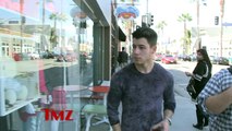 Nick Jonas On Tour With Brothers Ex?!