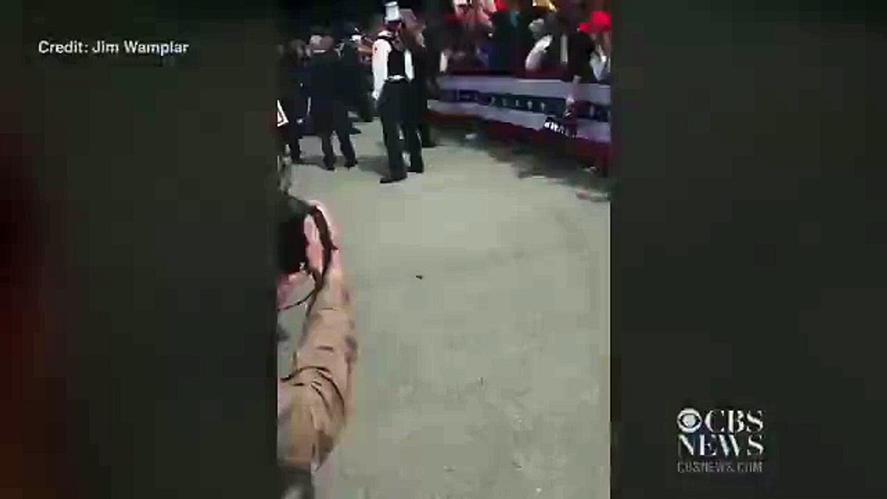Protester rushes Trump on rally stage, gets kicked out of event