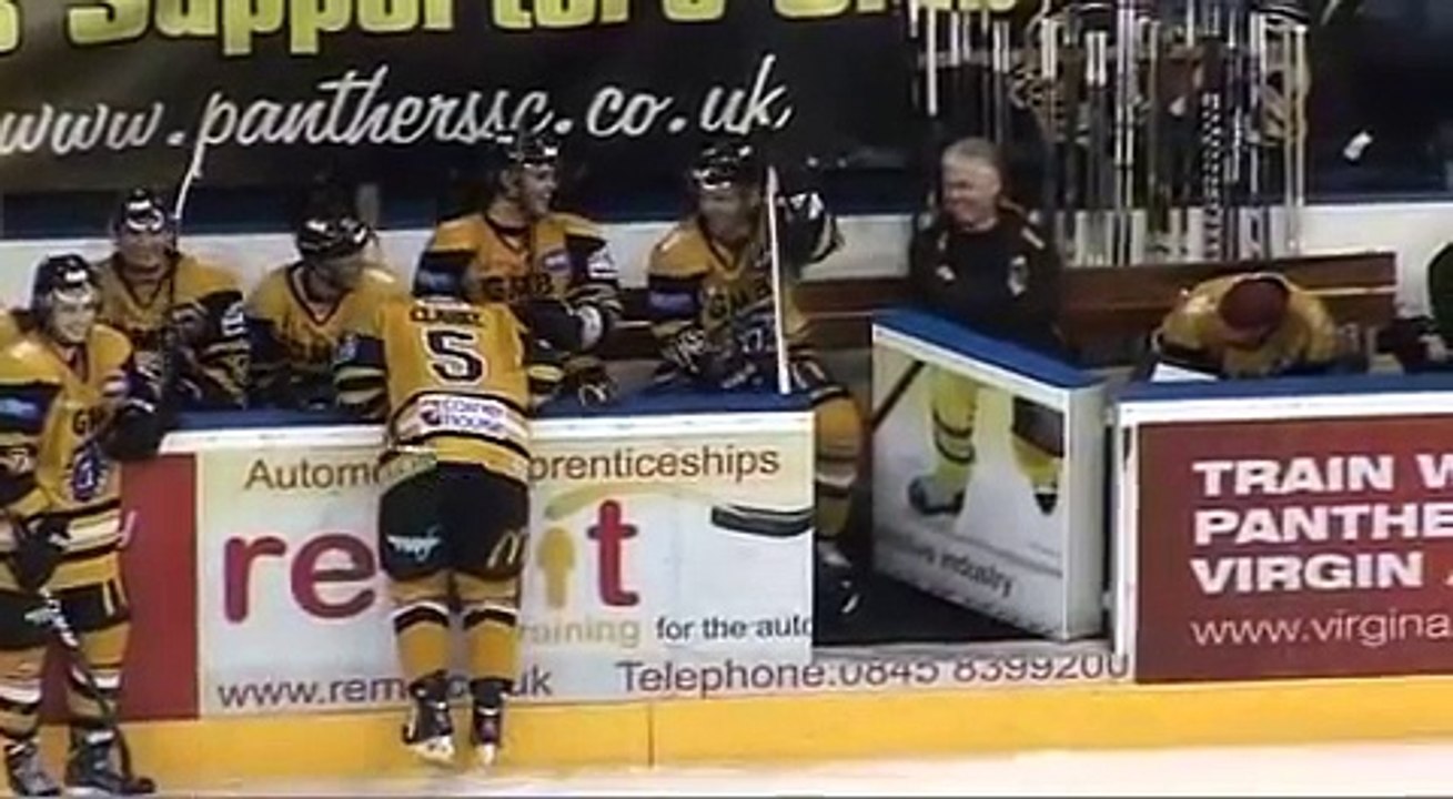 Ex NHL Ice Hockey star water skis behind Zamboni at pro game in Nottingham