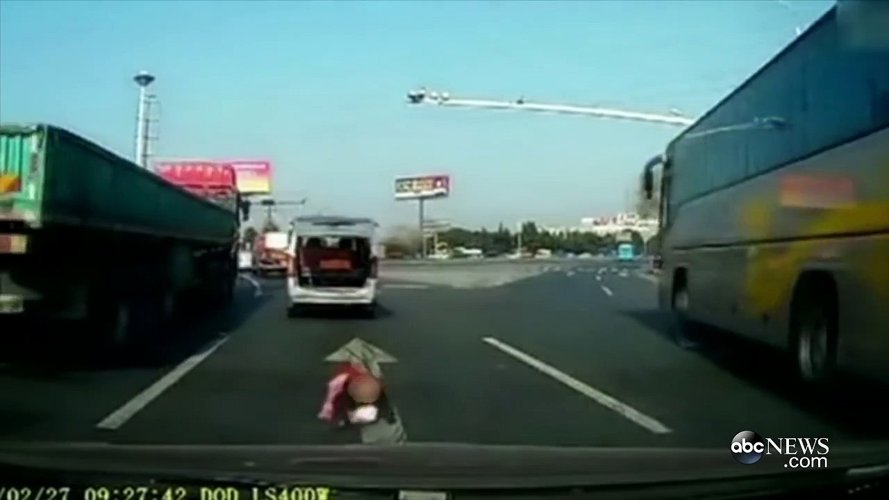 WATCH: Toddler Falls Out of Van Into Oncoming Traffic