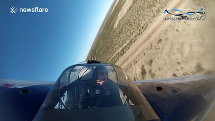 Stunt pilot flies upside down
