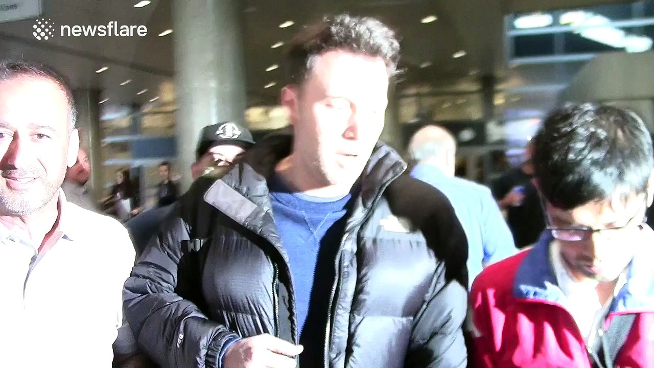Ben Affleck poses for pictures with fans in LA
