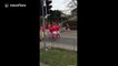 These Welsh rugby players set up a line-out on a busy road ahead of England v Wales