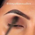 Simple brown smokey eyes.