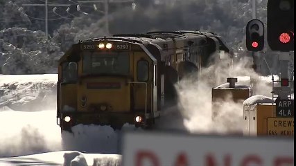 Latest Spectacular footage Train plowing through deep snow Arthurs Pass