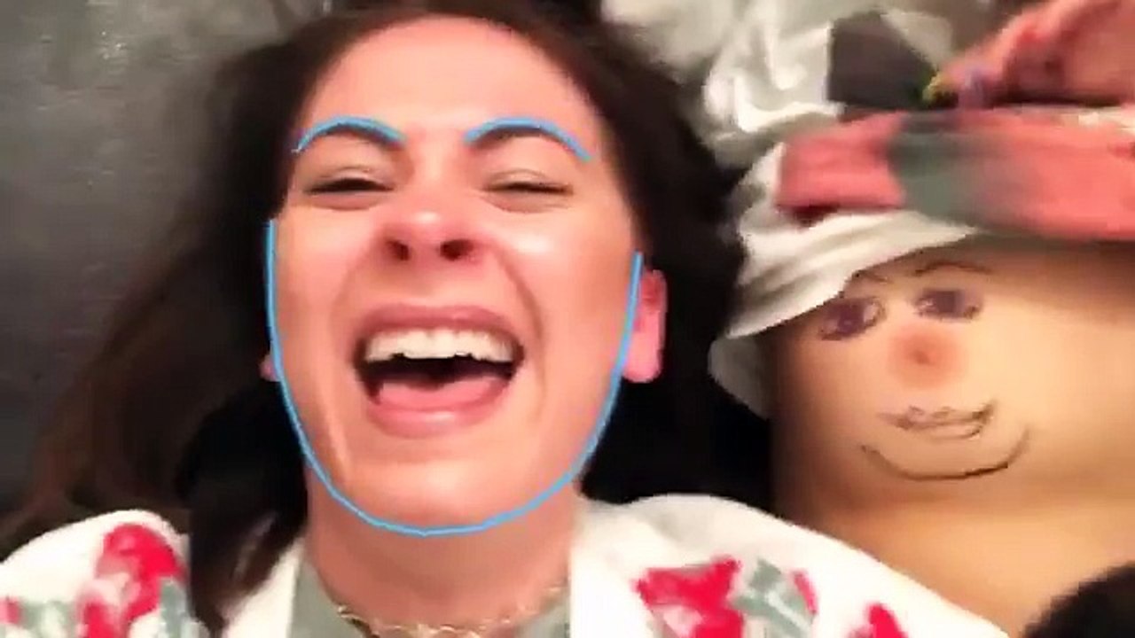A Girl Likes to Use the Application Face Swap Live with brea