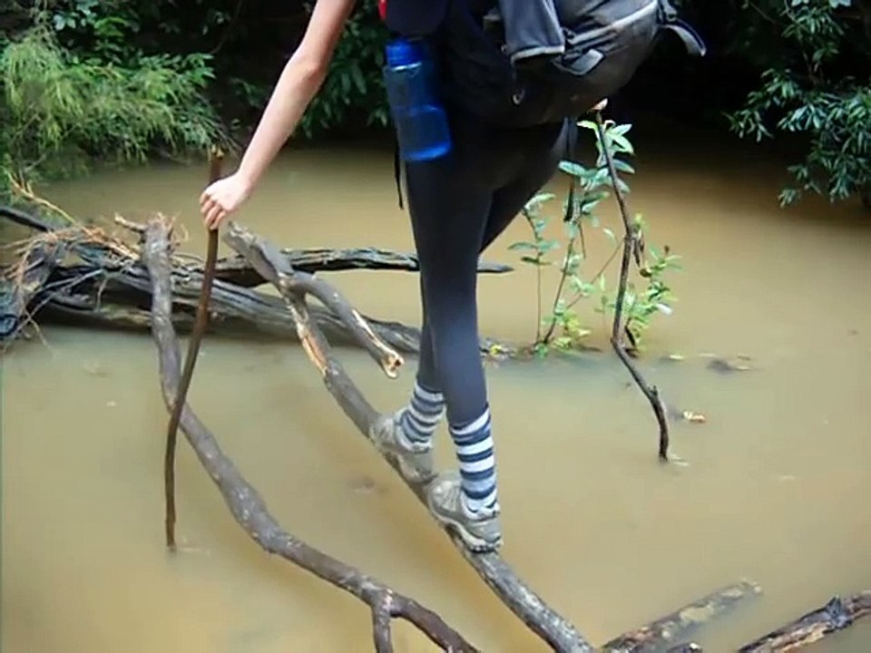 Girl falling into river