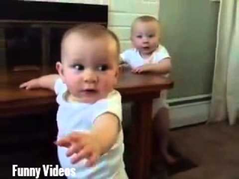 Dad’s Trying To Film His Twins Learning To Stand, But Their Reaction Is Precious