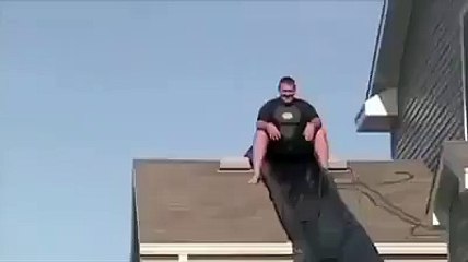 man is craling to fell into swiming pool