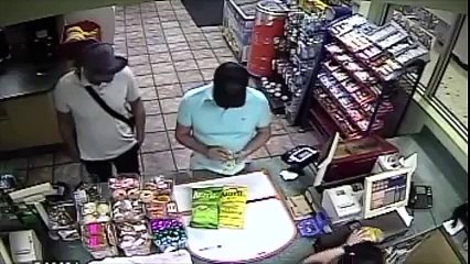 Raw Video: Men Place Card Skimmer on ATM Store Machine!