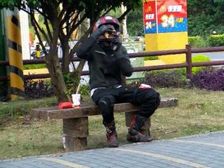 Eating McDonald's food....the true biker way.