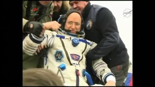 Astronaut twin Scott Kelly returns after year in space