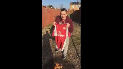 arsenal fan trying to burn teams shirt