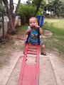 abdul hadi sweet baby playing in garden with his father