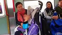 Shocking video train passenger snaps & screams in the face of strangers crying child in H