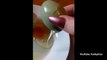 Bizarre moment woman cracks egg to find another one INSIDE it